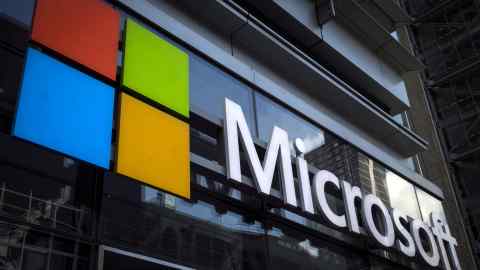 The Microsoft logo is seen on an office building in New York City