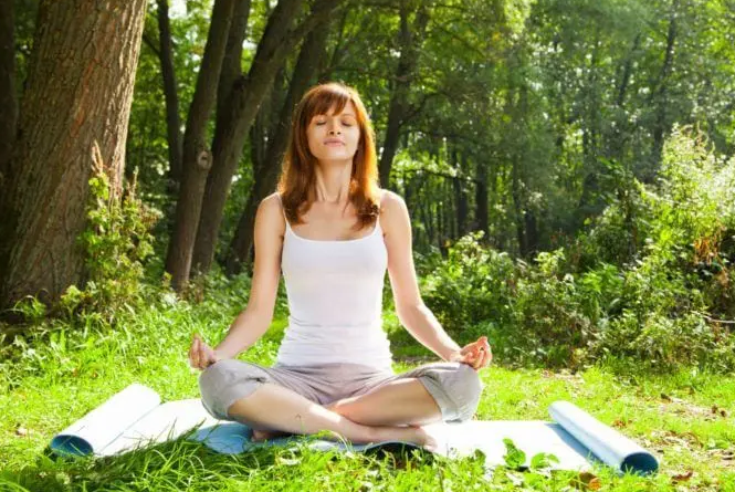 Visuals of people practicing relaxation techniques like deep breathing, meditation, or yoga.
